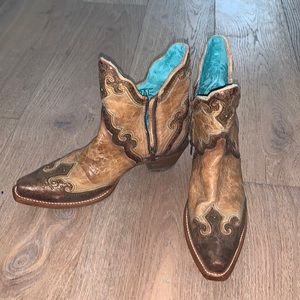 Never worn corral boots. Too big for me
